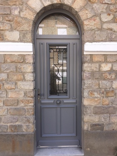 Porte d'entrée en bois
