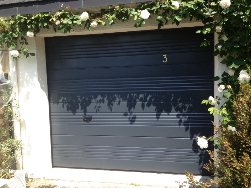 Isoler porte donnant au garage