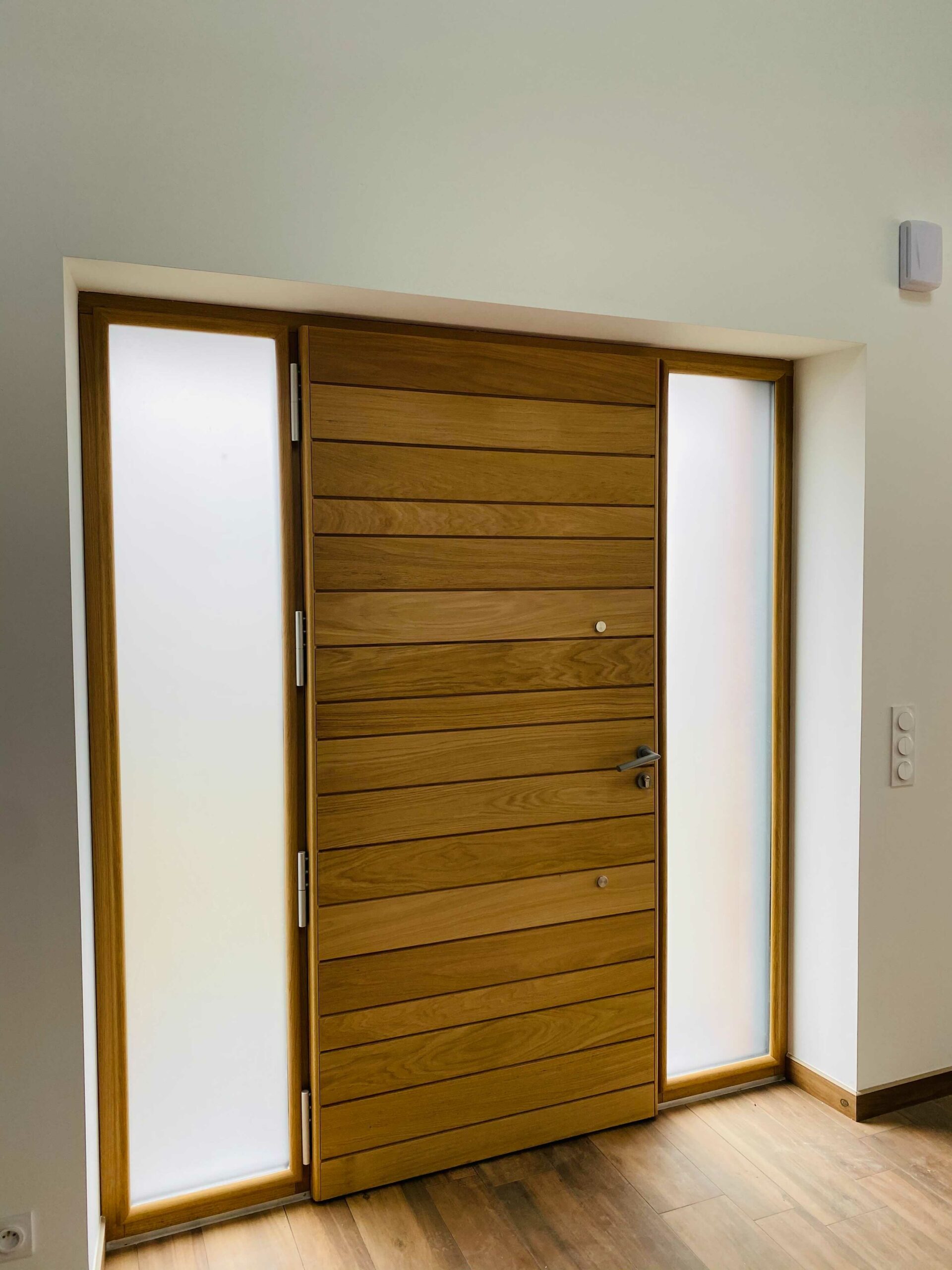 La porte d’entrée mixte Aluminium/Bois